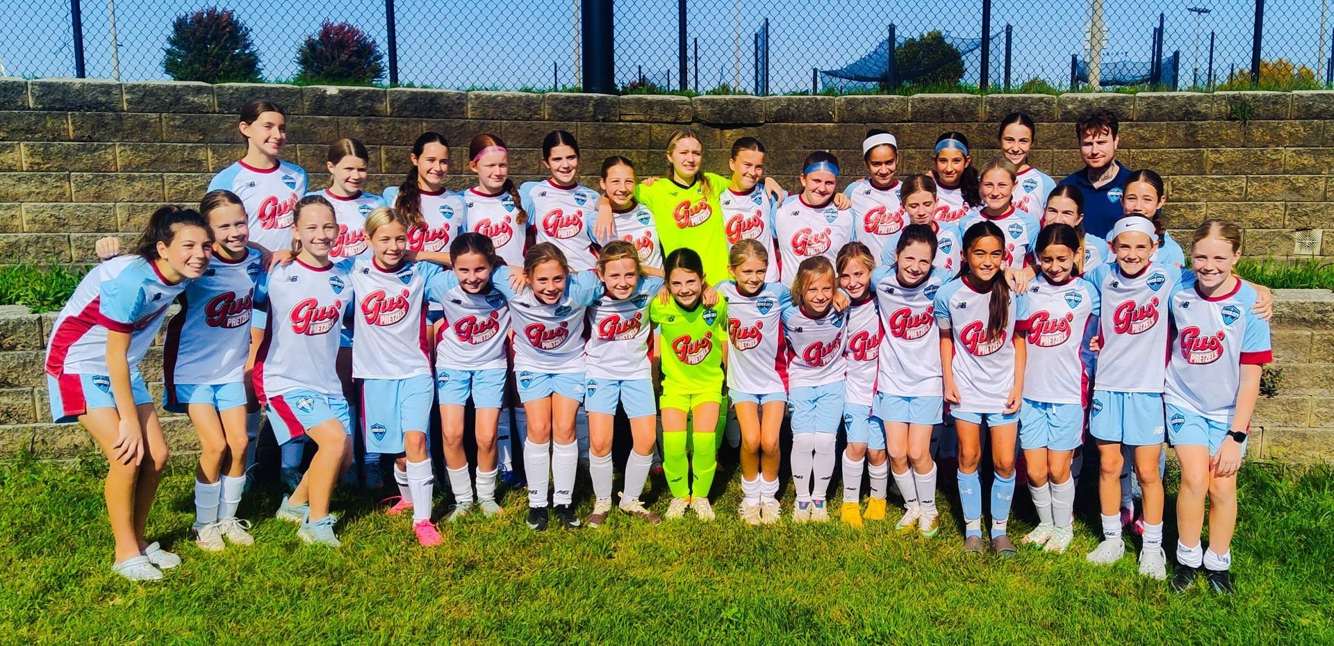 River City FC girls team in the white and sky blue home kit